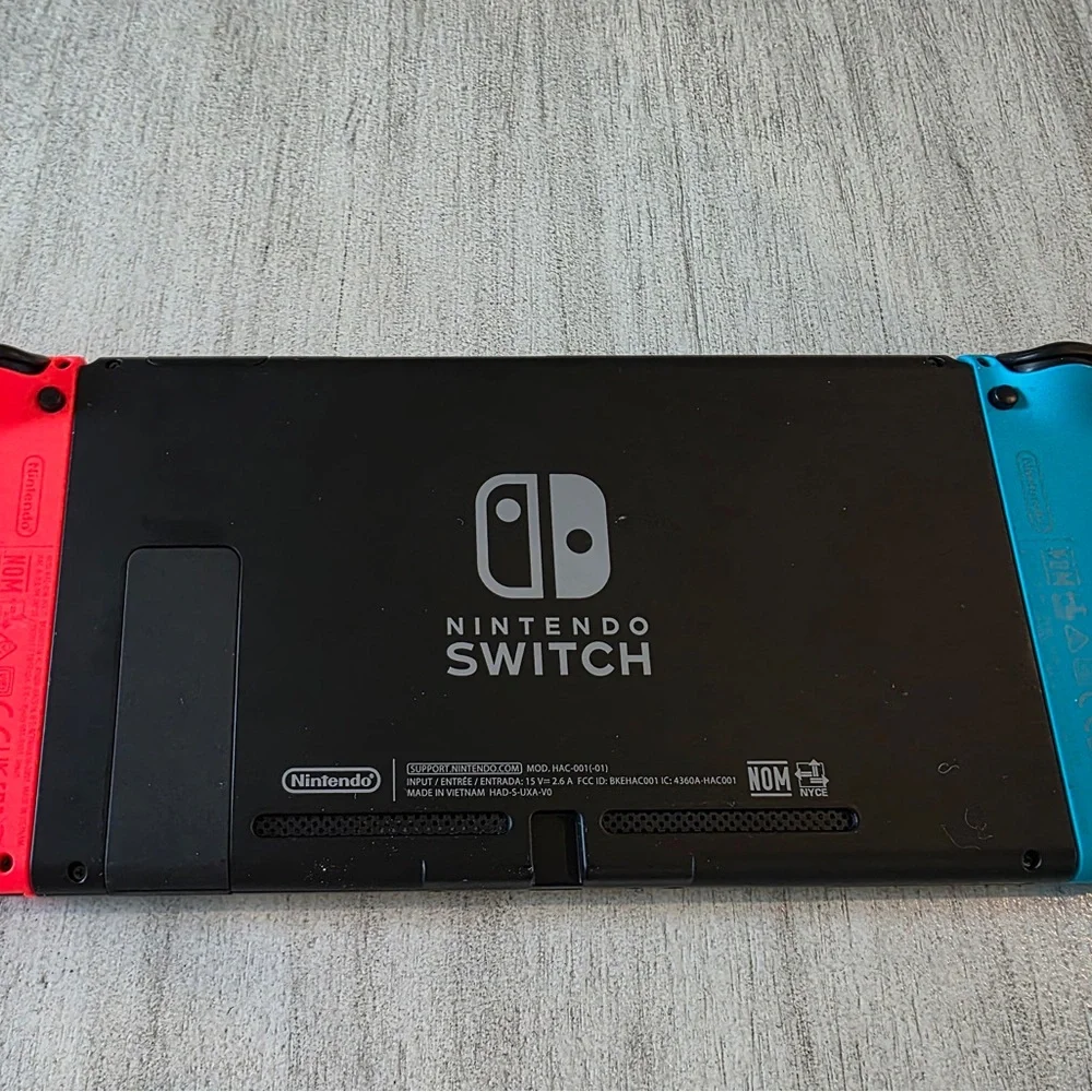 Nintendo Switch with Neon Blue and Neon Red Joy-Con - Handheld Gaming Console - Picture 3 of 9